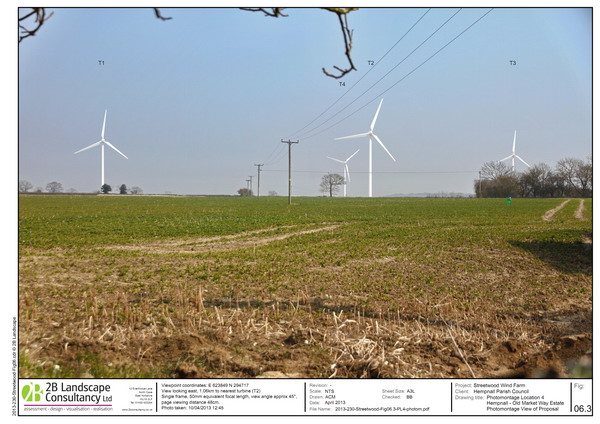 open view of turbines from village edge