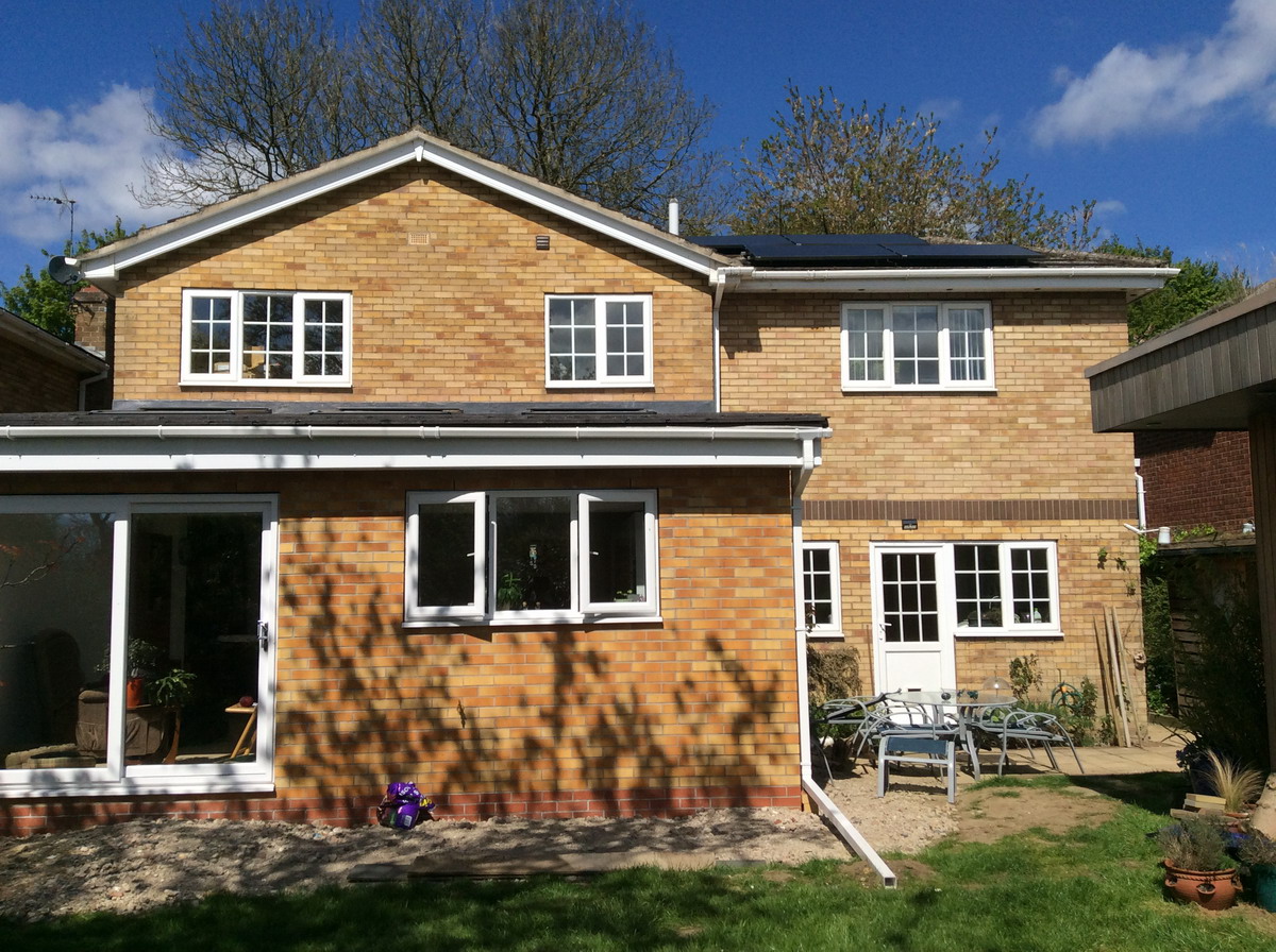 Downspout from the extension drain on to the lawn - a functional but basic solution