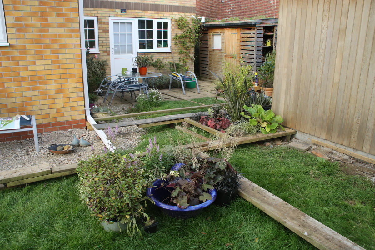 Planks and plants help us to visualise the size and level of the patio and deck