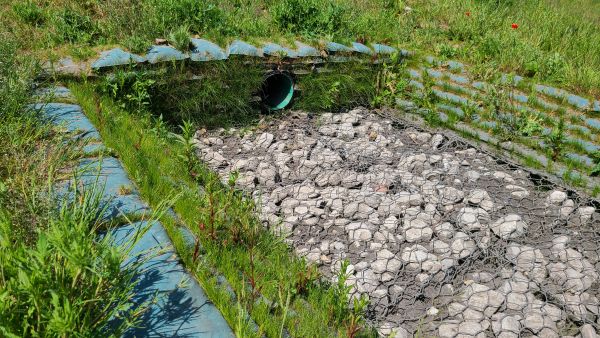 an inlet to a detention basin, constructed from Geobags